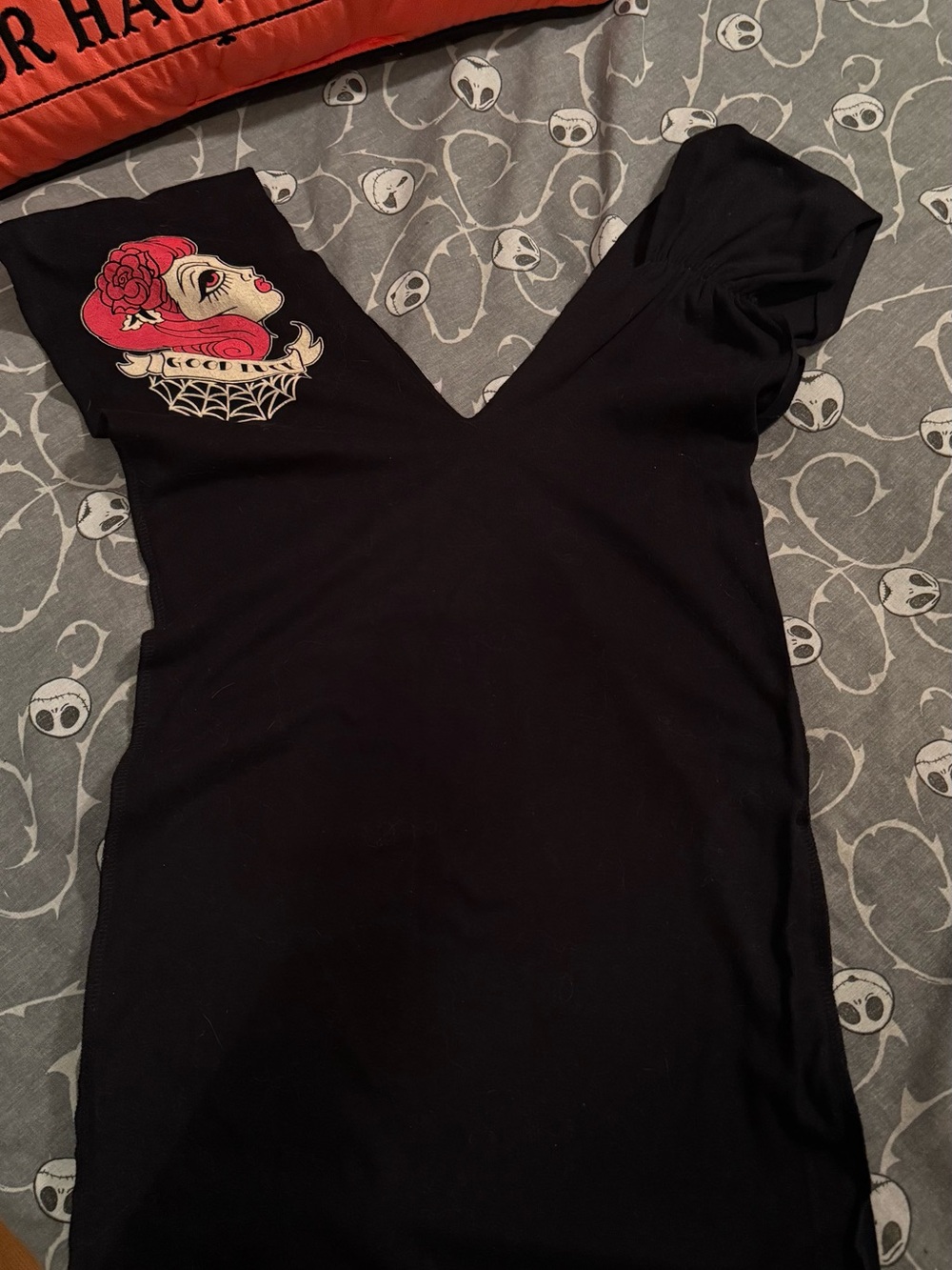 Vintage Y2K Deep V Neck women’s Tee with pinup girl and spider web.
